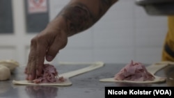 Le chachito, un petit pain de pâte mi-sucré traditionnellement fourré au jambon