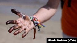 Les conséquences de la marée noire dans une zone côtière du Venezuela