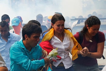 Maria Corina Machado quittant le
